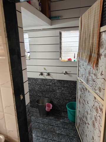 Bathroom in 1 BHK Apartment at Jai Shiv Shankar CHS, Dombivli West – for Rent