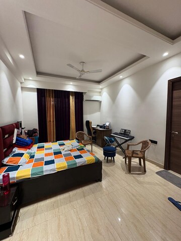 Bedroom in 4 BHK Builder Floor at Ansal API Esencia, Sector 67 – for Rent