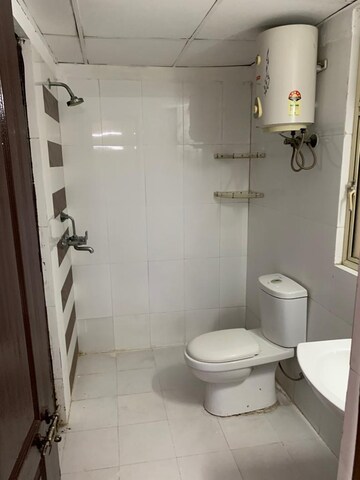 Bathroom in 2 BHK Apartment at Amrapali Eden Park, Sector 50 – for Rent