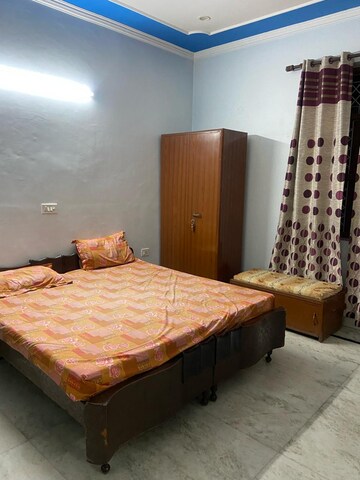 Bedroom in 1.5 BHK Builder Floor at Ansal Plaza Sector-23, Sector 23 – for Rent