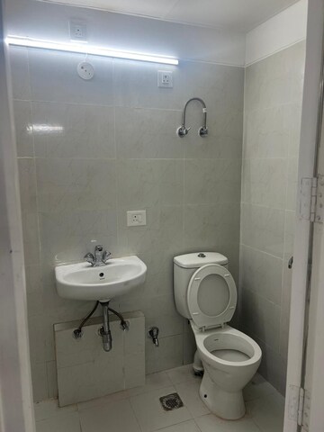 Bathroom in 4 BHK Apartment at BPTP Parkland Pride, Sector 77 – for Rent