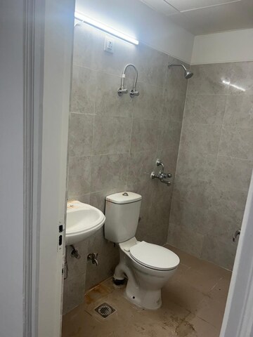 Bathroom in 4 BHK Apartment at BPTP Parkland Pride, Sector 77 – for Rent