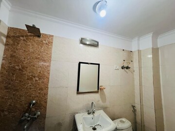 Bathroom in 2 BHK Builder Floor at Chattarpur – for Sale
