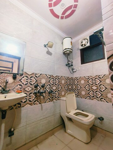 Bathroom in 2 BHK Builder Floor at Dwarka Mor – for Rent