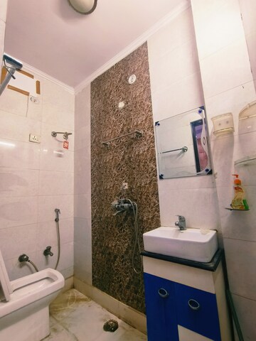 Bathroom in 2 BHK Builder Floor at Dwarka Mor – for Rent