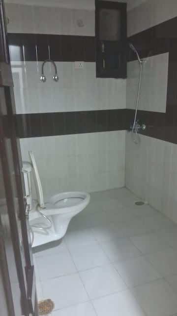Bathroom in 3 BHK Apartment at Green Valley Heights, Dhakoli Village – for Sale