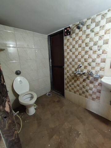 Bathroom in 2 BHK Apartment at Vijay Vilas Vega Building 1 to 6 CHS Ltd, Kavesar – for Rent