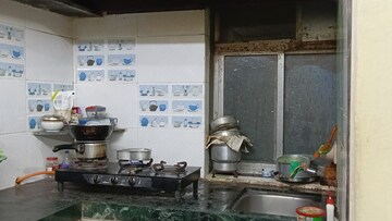 Kitchen in 1 BHK Apartment at Devdoot CHS, Majiwada – for Sale