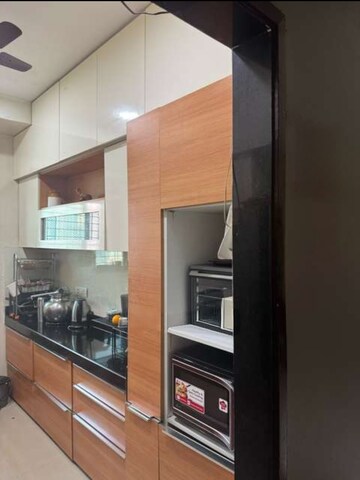 Kitchen in 2 BHK Apartment at Rustomjee Athena, Majiwada – for Rent