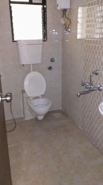 Bathroom in 2 BHK Apartment at Bhoomi Acropolis, Virar West – for Rent