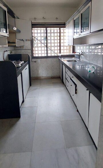 Kitchen in 3 BHK Apartment at Panchavati Gardens, Malad East – for Sale