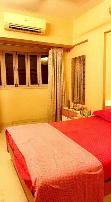 Bedroom in 2 BHK Apartment at Dheeraj Heritage Residency, Santacruz West – for Rent
