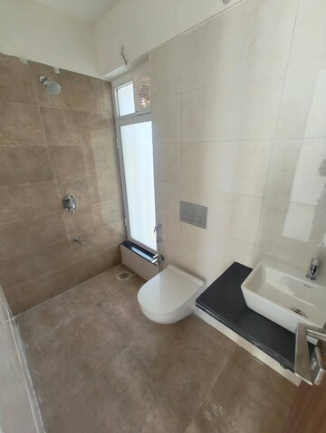 Bathroom in 1 BHK Apartment at Omkar Signet, Malad East – for Rent