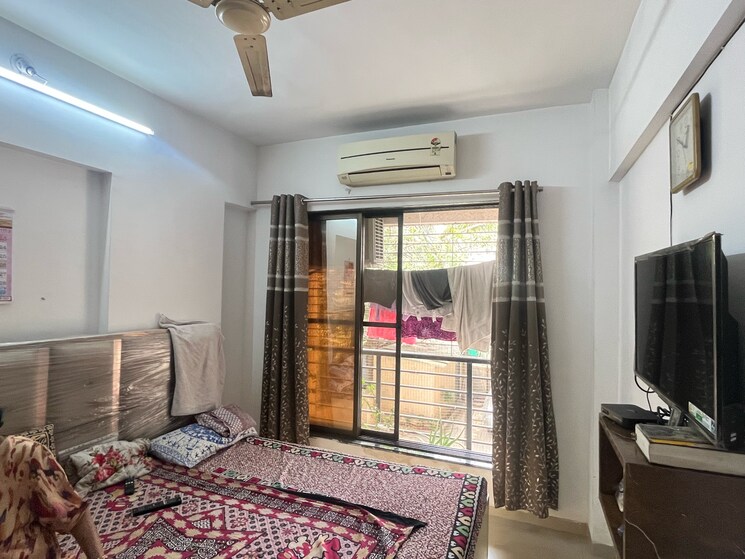 Bedroom, vasudev-sky-high 2 Bedroom 614 Sq.Ft. Apartment In Kanakia Road Thane 8467546