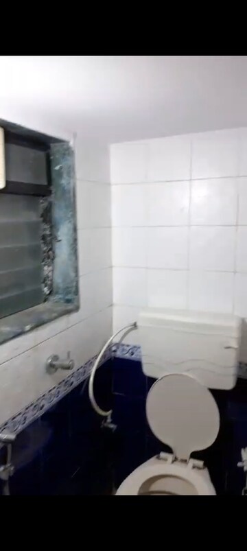 Bathroom in 1 BHK Apartment at Suyog CHS Tilak Nagar, Tilak Nagar – for Rent