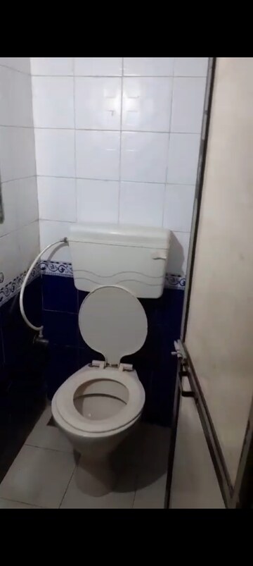 Bathroom in 1 BHK Apartment at Suyog CHS Tilak Nagar, Tilak Nagar – for Rent