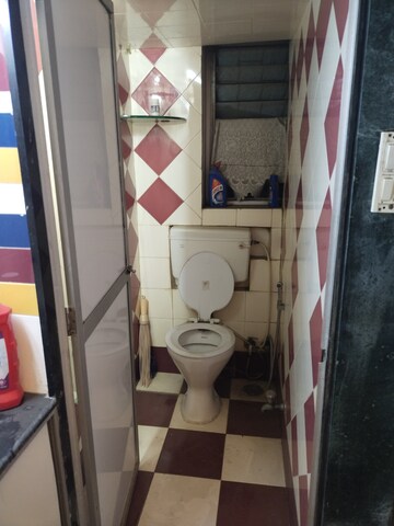 Bathroom in 2 BHK Apartment at Ballena CHS, Chedda Nagar – for Rent