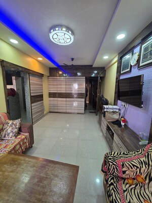 Living Room in 1 BHK Apartment at Vighnahatra Modern Enclave, Agripada – for Sale