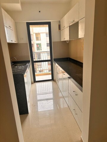 Kitchen in 2 BHK Apartment at Lodha Lakeshore Greens, Dombivli East – for Rent