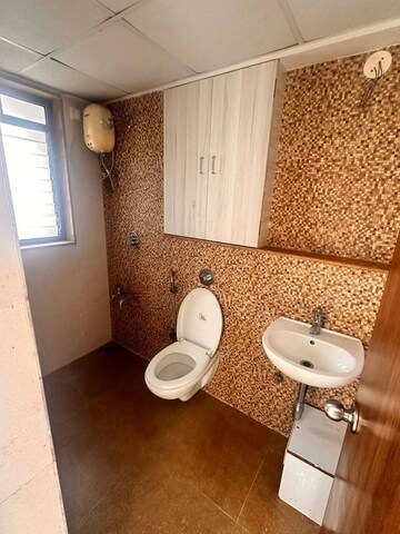 Bathroom in 2 BHK Apartment at Lodha Lakeshore Greens, Dombivli East – for Rent