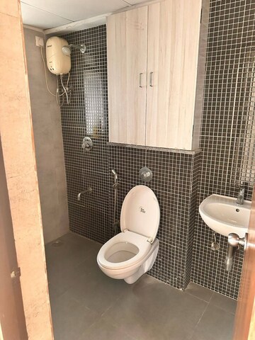 Bathroom in 2 BHK Apartment at Lodha Lakeshore Greens, Dombivli East – for Rent