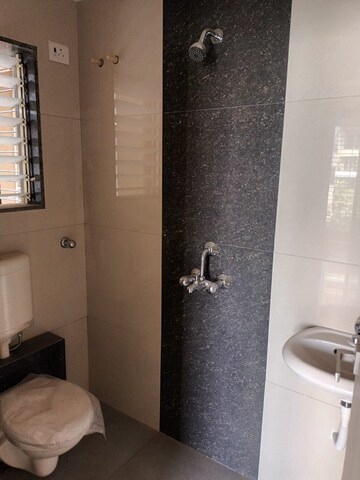 Bathroom in 3 BHK Apartment at Mohan Suburbia, Ambernath West – for Sale