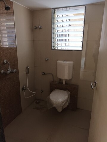 Bathroom in 3 BHK Apartment at Mohan Suburbia, Ambernath West – for Sale