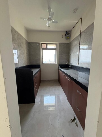 Kitchen in 2 BHK Apartment at Sheth Irene, Malad West – for Rent