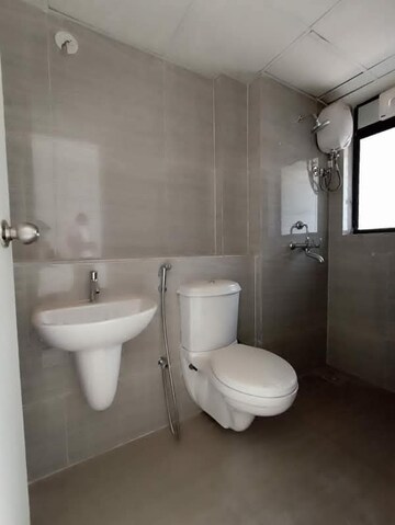 Bathroom in 1 BHK Apartment at Runwal Gardens, Dombivli East – for Rent