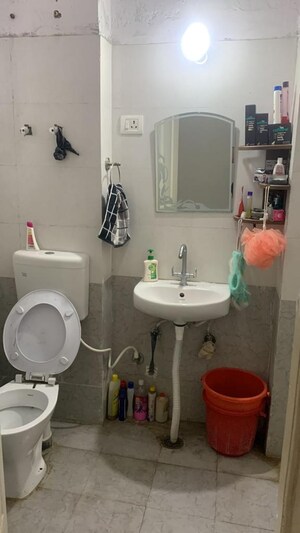Bathroom in 2 BHK Apartment at Milan Earth, Raj Nagar Extension – for Sale