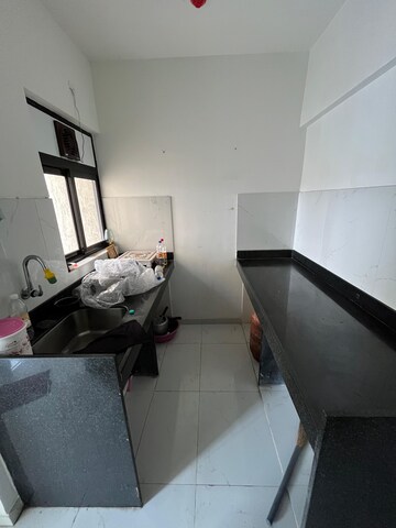 Kitchen in 1 BHK Apartment at Runwal Gardens Phase I, Dombivli East – for Rent