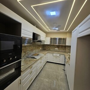 Kitchen in 4 BHK Builder Floor at Ansal API Versalia, Sector 67a – for Sale