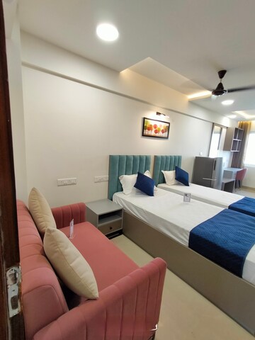 Living Room in Studio Apartment at Okay Plus Solitaire Suites, Ramnagariya – for Rent