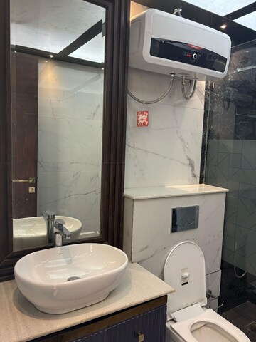 Bathroom in 4 BHK Apartment at Vastu Apartments, Sector 55 – for Rent