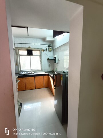 Kitchen in 2 BHK Apartment at Shubharambh Complex, Manpada – for Rent