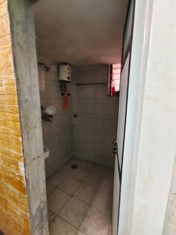 Bathroom in 3 BHK Apartment at Kandarpada – for Rent