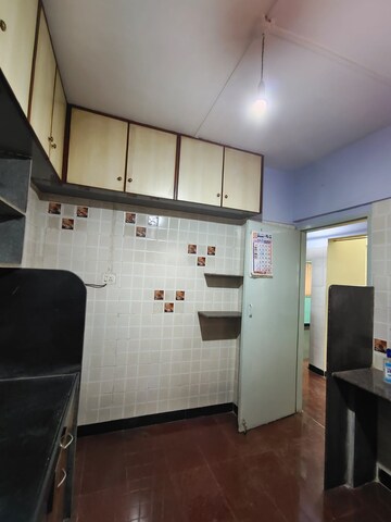 Kitchen in 3 BHK Apartment at Kandarpada – for Rent