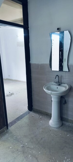 Bathroom in 3 BHK Apartment at Vishwakarma Colony – for Sale