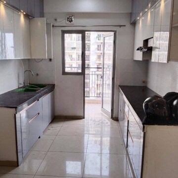 Kitchen in 2.5 BHK Apartment at Prateek Laurel, Sector 120 – for Rent