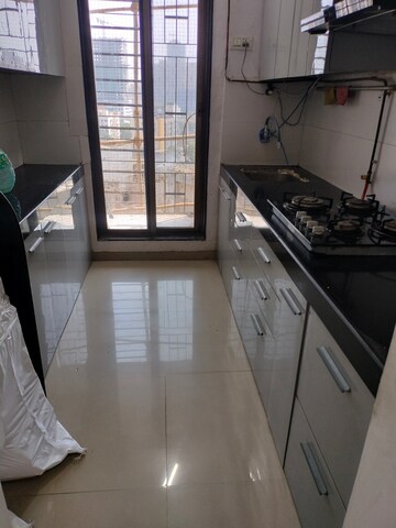 Kitchen in 1.5 BHK Apartment at Squarefeet Grand Square, Anand Nagar – for Rent