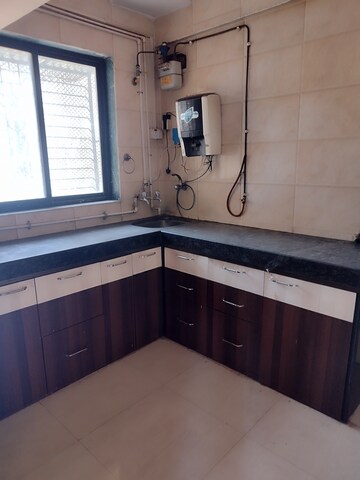 Kitchen in 1 BHK Apartment at Rai Baliram Enclave, Kalyan East – for Rent