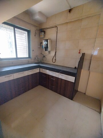 Kitchen in 1 BHK Apartment at Rai Baliram Enclave, Kalyan East – for Rent