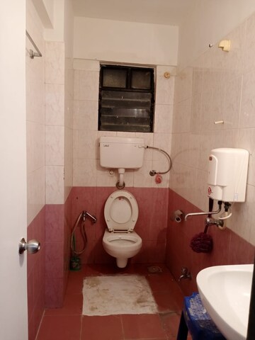 Bathroom in 2 BHK Apartment at Montreal Tower, Andheri West – for Sale