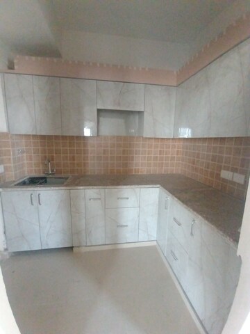 Kitchen in 2 BHK Apartment at Mahagun Mywoods, Sector 16c Greater Noida – for Rent