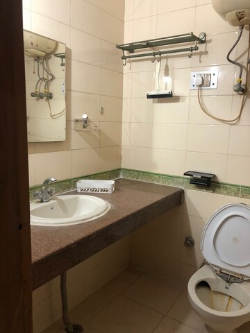 Bathroom in 3 BHK Apartment at Huda CGHS, Sector 56 – for Rent