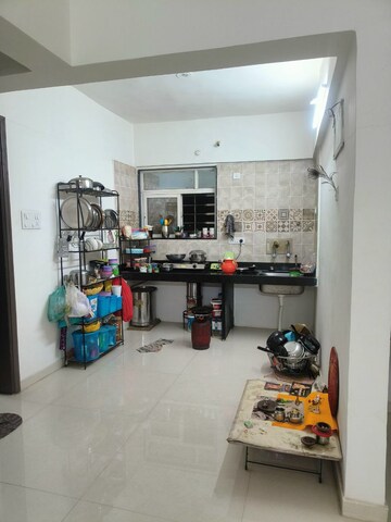 Kitchen in 2 BHK Apartment at Ajnara Gen X, Dundahera – for Sale