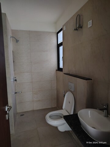Bathroom in 1.5 BHK Apartment at Chhatikara – for Sale