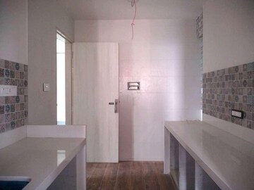 Kitchen in 1.5 BHK Apartment at Neumec Shreeji Towers, Wadala East – for Sale