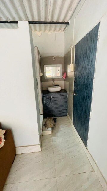 Bathroom in 2 BHK Apartment at Aastha Heights, Goregaon West – for Rent