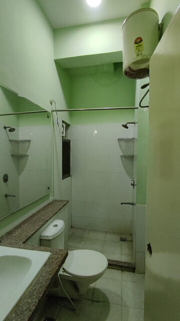 Bathroom in 3 BHK Apartment at Moti Nagar – for Rent